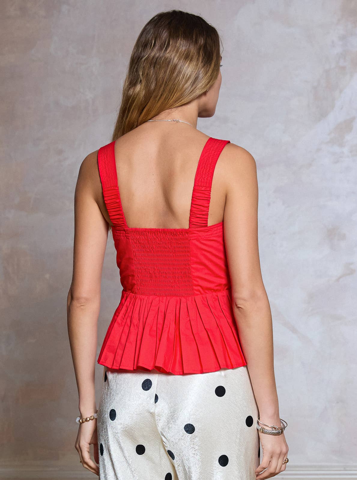 Sleeveless Embroidered Peplum Top