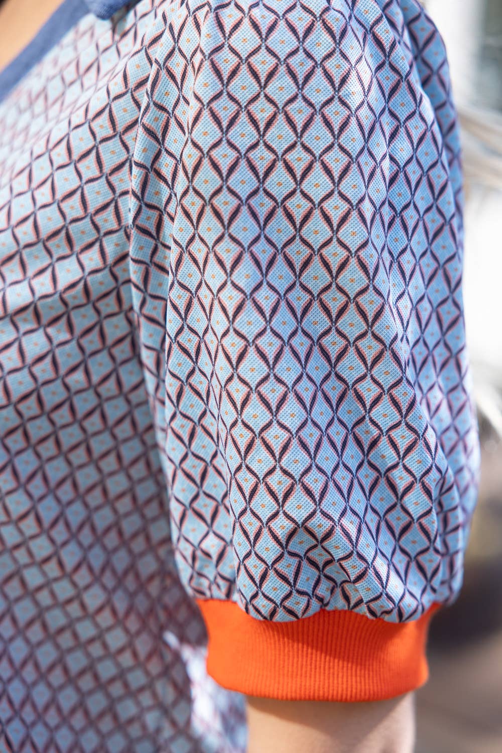 Collared V-Neck Ribbed Hem