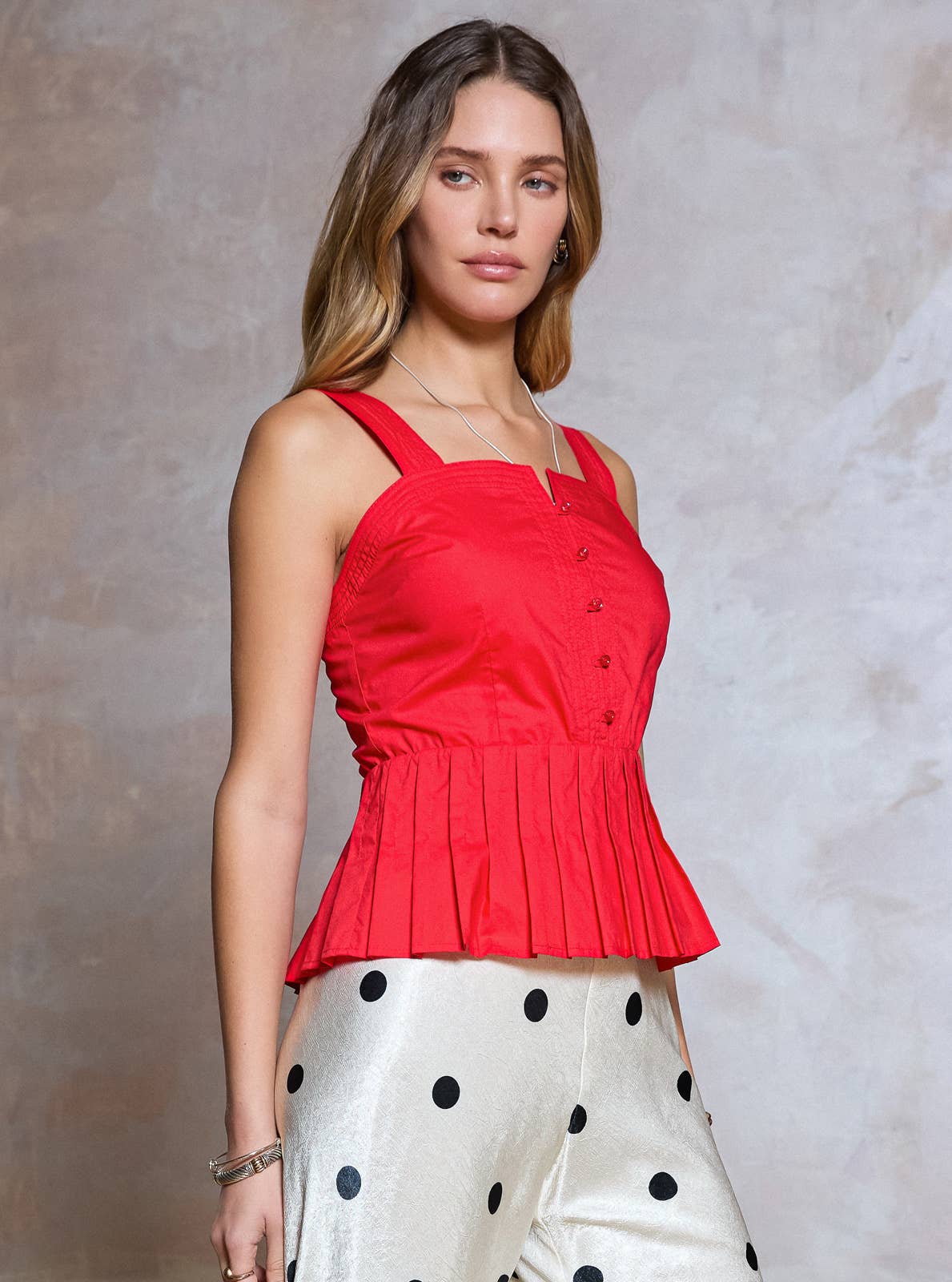 Sleeveless Embroidered Peplum Top